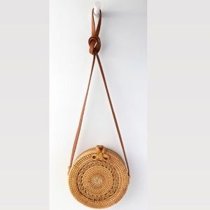 Tan round woven purse